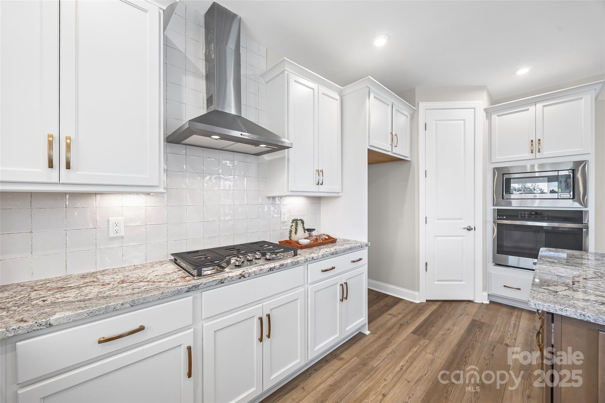 5075 Valita Road York, SC 29745 - Photo 15 of 48 a kitchen with stainless steel appliances granite countertop a stove and a refrigerator