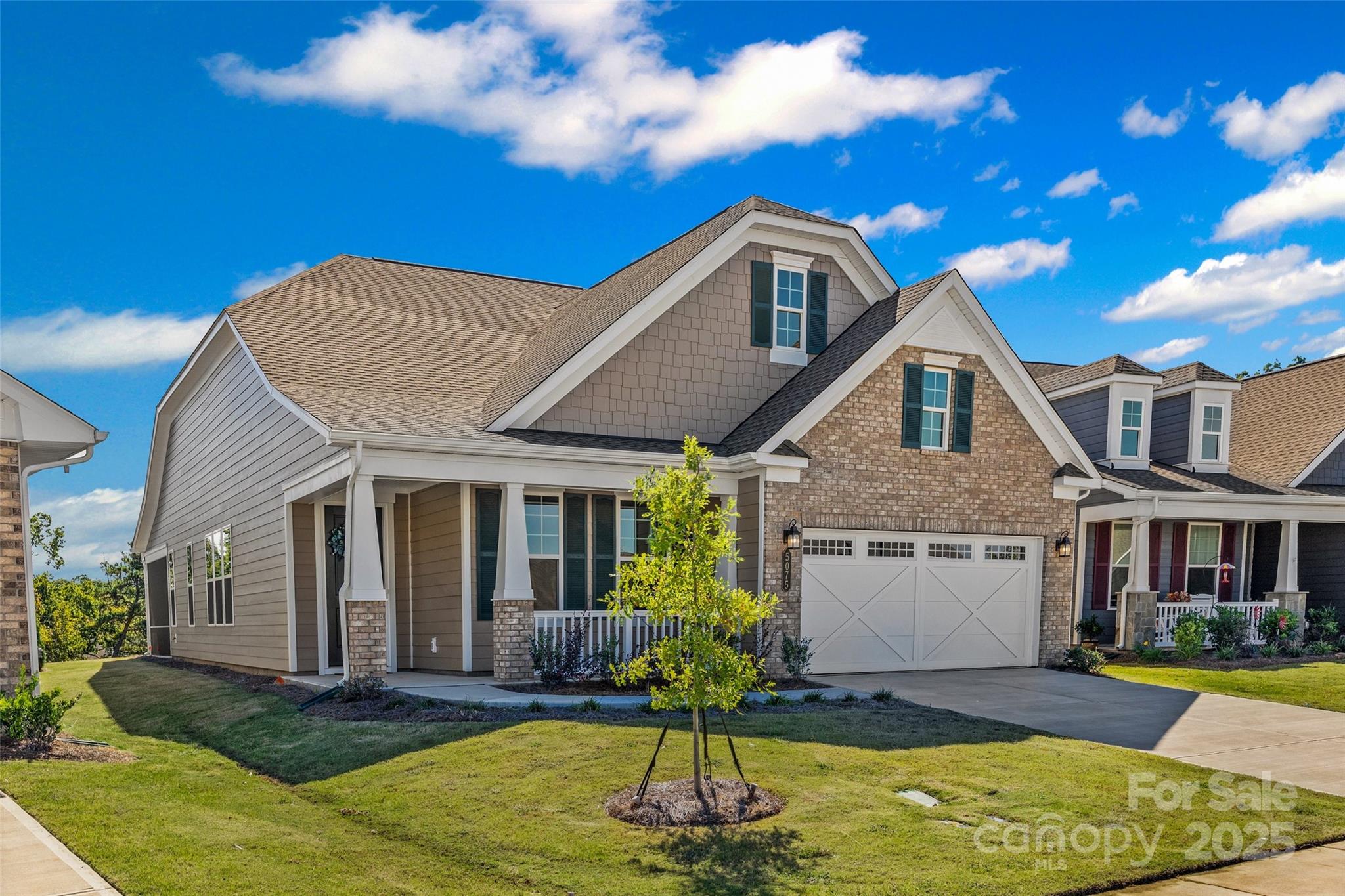 5075 Valita Road York, SC 29745 - Photo 35 of 48 a front view of a house with yard chairs and floor to ceiling window