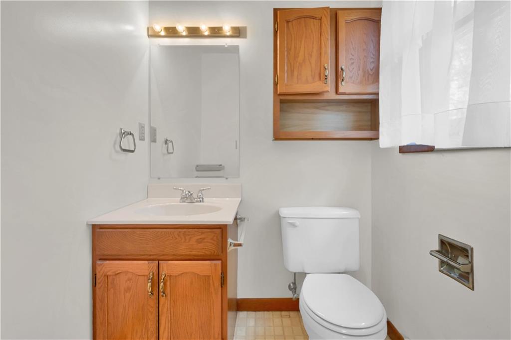 374 Goldsmith Road Pittsburgh, PA 15237 - Photo 14 of 25 a bathroom with a toilet a sink and a mirror