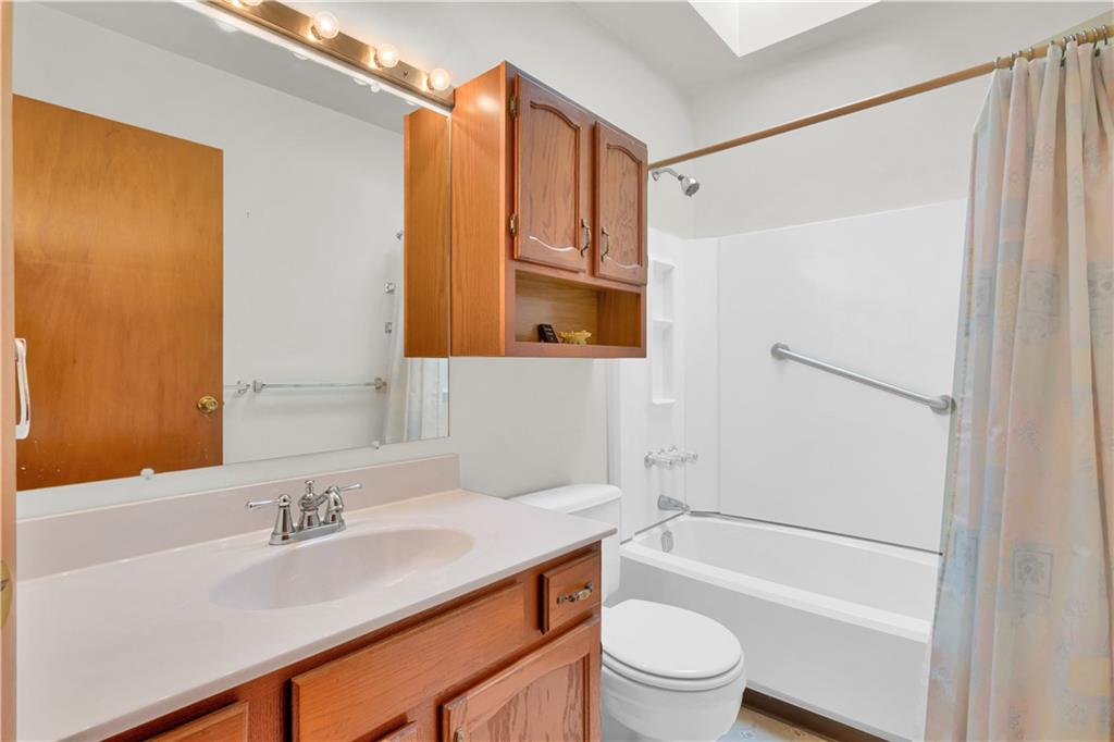 374 Goldsmith Road Pittsburgh, PA 15237 - Photo 17 of 25 a bathroom with a sink a toilet and shower