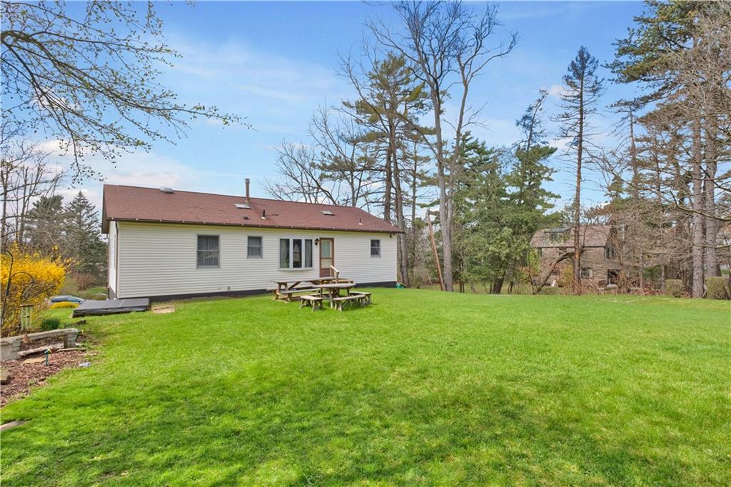 374 Goldsmith Road Pittsburgh, PA 15237 - Photo 24 of 25 a view of a house with a yard and sitting area