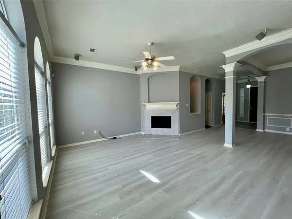 a large kitchen with kitchen island granite countertop a large counter top stainless steel appliances and cabinets