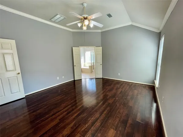 a bathroom with a tub a sink and a mirror