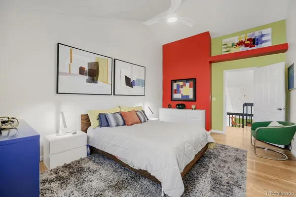 a bed room with a bed and a couch