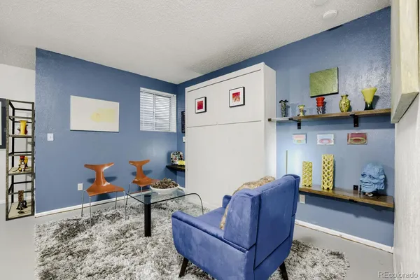 a living room with furniture and a couch