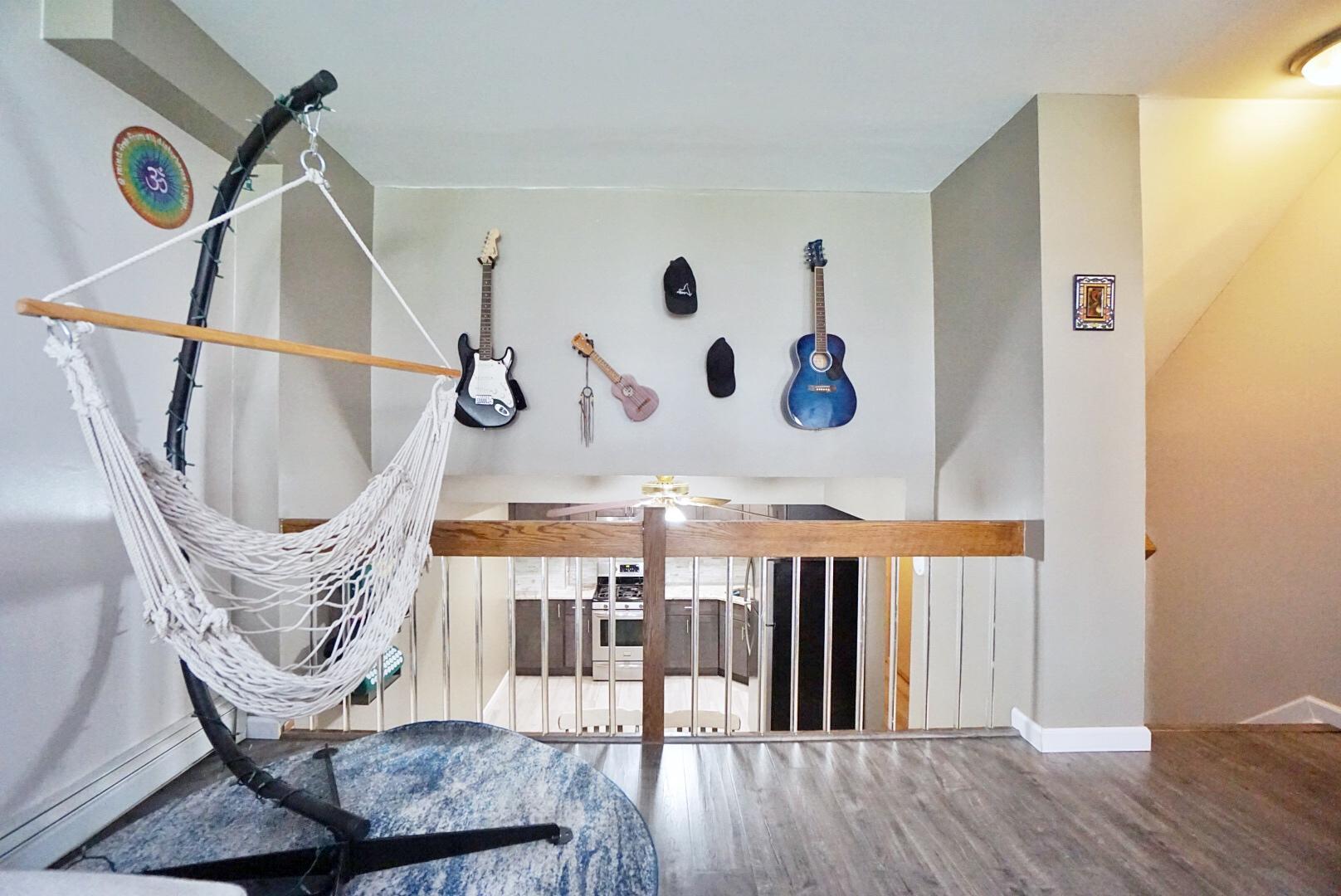 40 Racal Court, Unit B1 Staten Island, NY 10314 - Photo 10 of 16 a view of a dining room with furniture wooden floor and front door