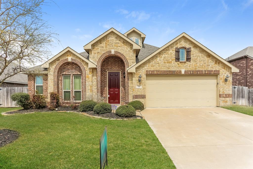 921 Lucetta Street Midlothian, TX 76065 - Photo 1 of 15 a front view of a house with garden