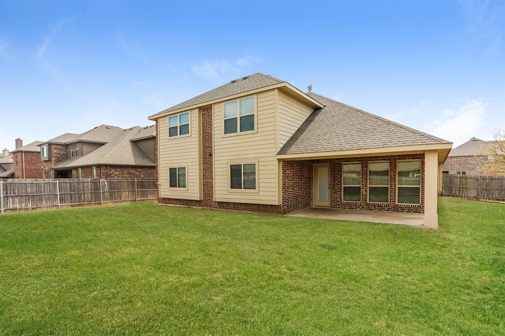 921 Lucetta Street Midlothian, TX 76065 - Photo 15 of 15 a view of a house with a yard and sitting area