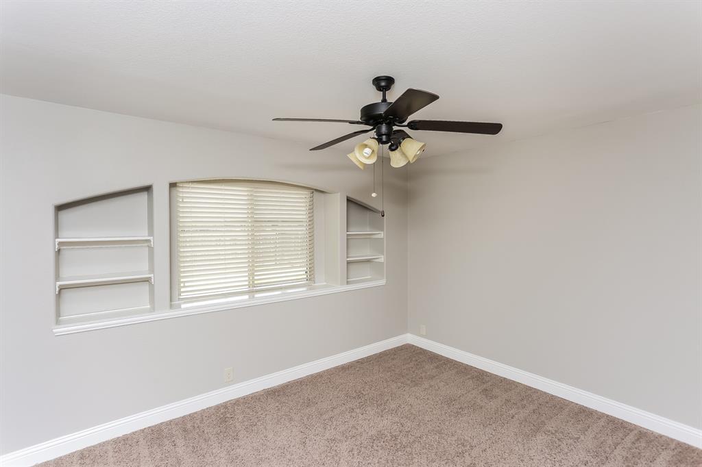 921 Lucetta Street Midlothian, TX 76065 - Photo 9 of 15 a view of a livingroom with a ceiling fan and window