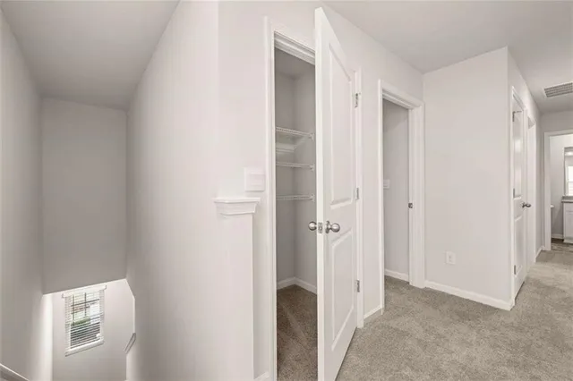 a view of entryway with bathroom