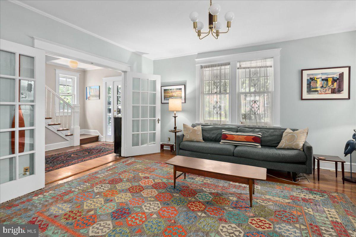6721 Piney Branch Road Northwest Washington, DC 20012 - Photo 20 of 78 a living room with furniture and a rug