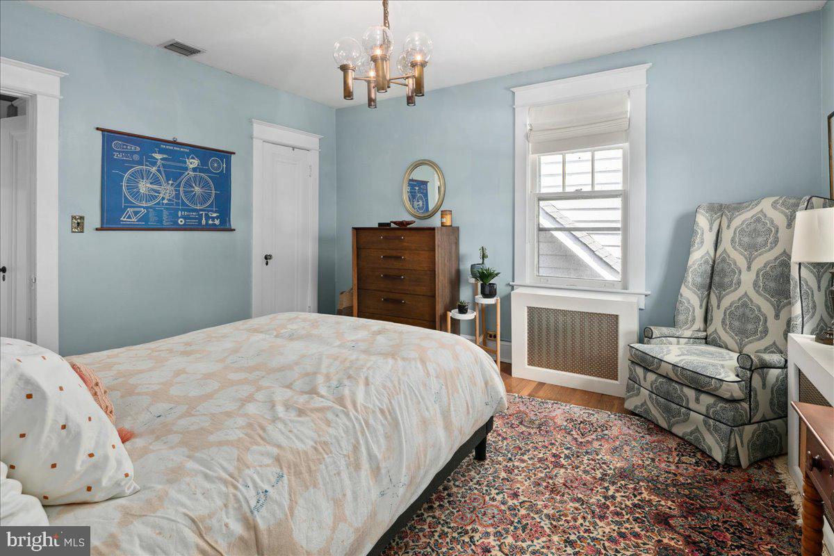 6721 Piney Branch Road Northwest Washington, DC 20012 - Photo 56 of 78 a bedroom with a bed dresser and a window