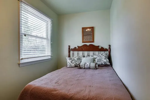 a view of a balcony with furniture