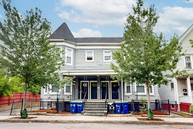 a front view of a building with street view