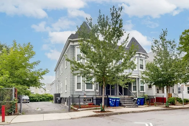 a front view of a building with street view