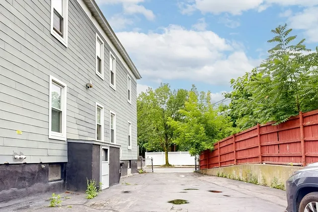 a view of a street with a house