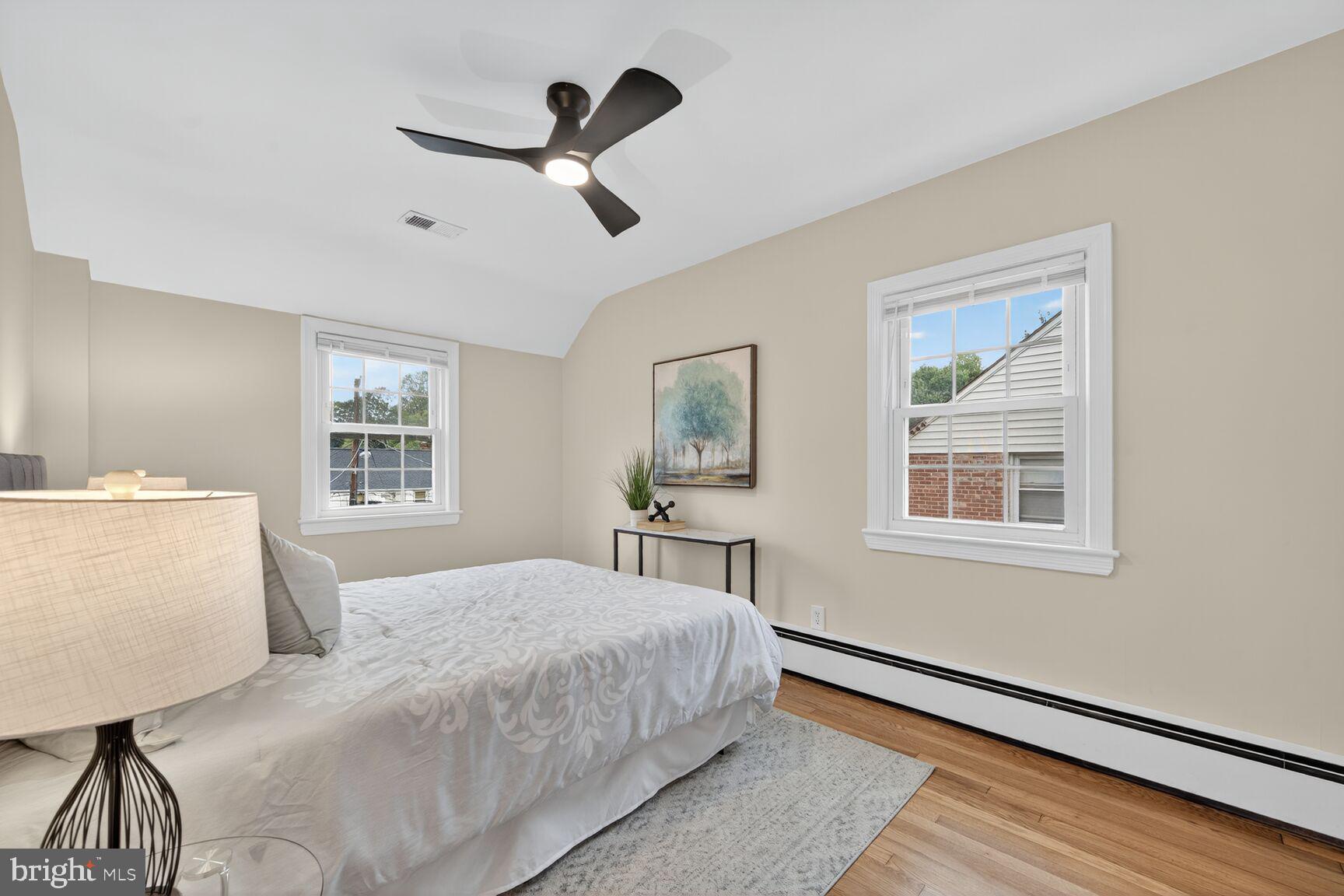 2813 Laurel Avenue Cheverly, MD 20785 - Photo 21 of 30 a bedroom with a large bed and a window