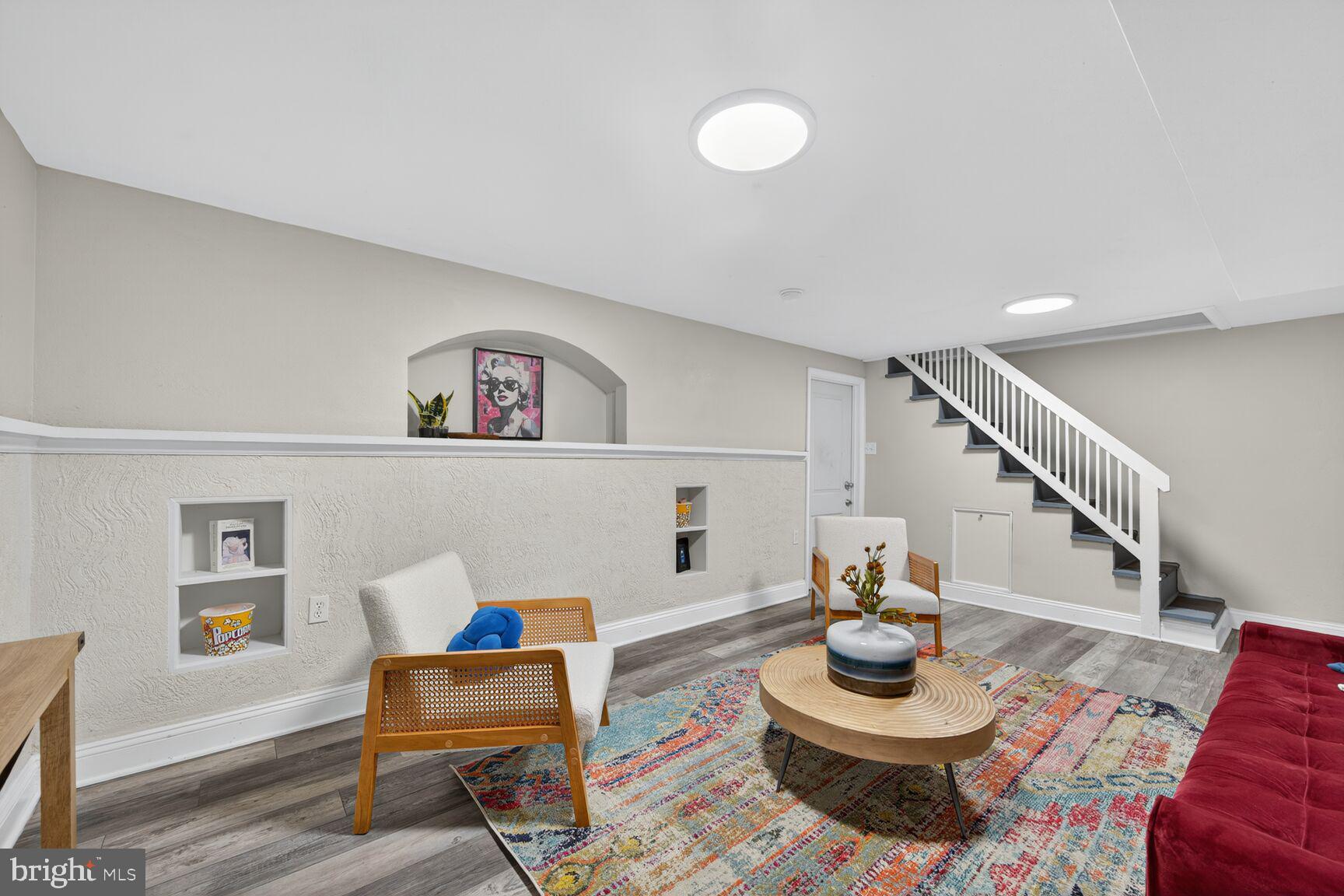 2813 Laurel Avenue Cheverly, MD 20785 - Photo 27 of 30 a living room with furniture and a wooden floor