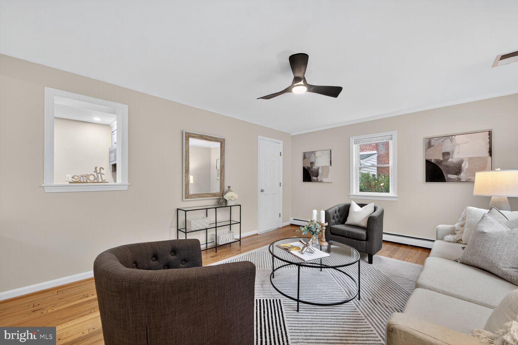 2813 Laurel Avenue Cheverly, MD 20785 - Photo 10 of 30 a living room with furniture and a couch