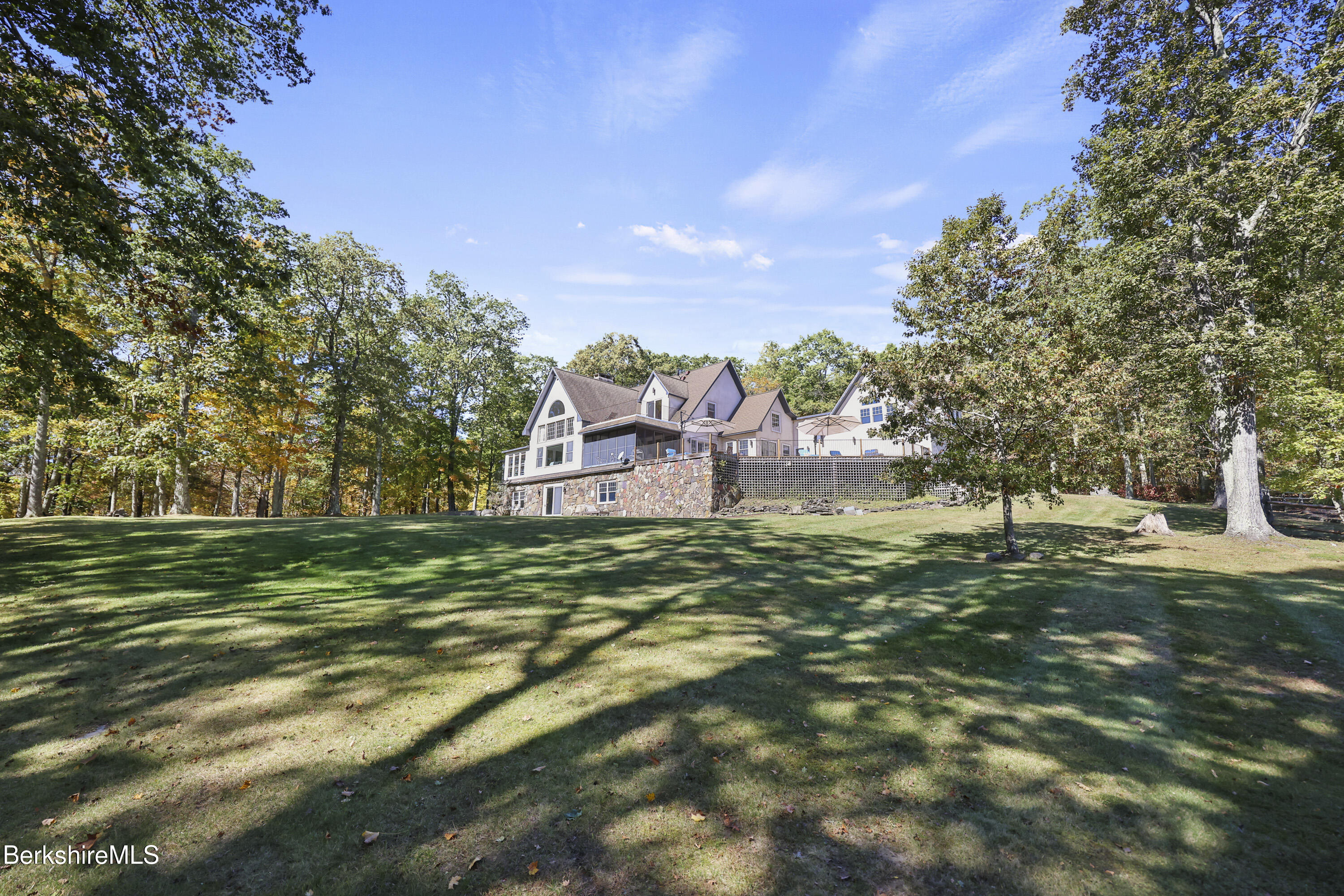 36 Millard Road Egremont, MA 01230 - Photo 12 of 93 a view of a golf course with a trees