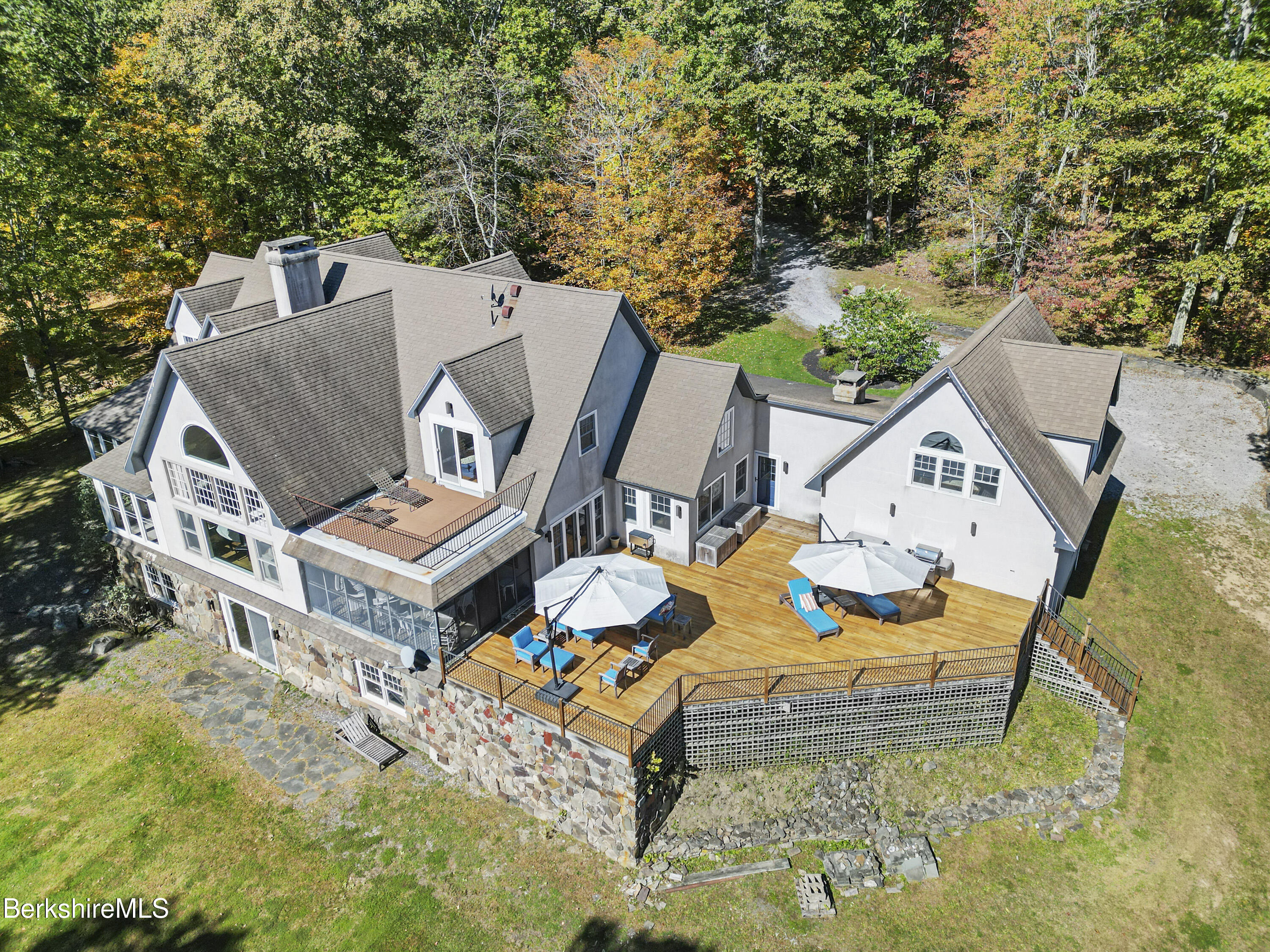 36 Millard Road Egremont, MA 01230 - Photo 13 of 93 an aerial view of a house with swimming pool and sitting space