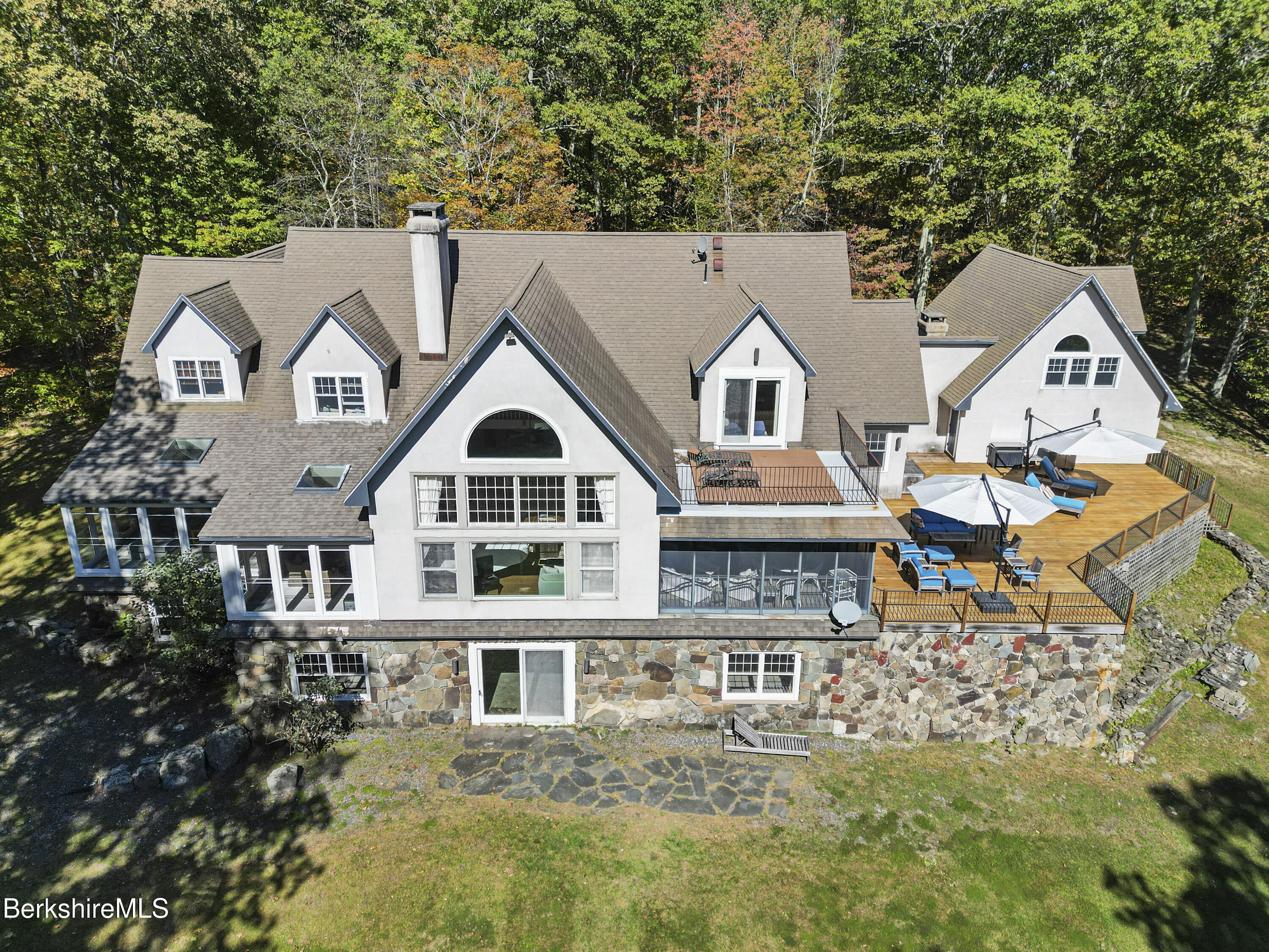 36 Millard Road Egremont, MA 01230 - Photo 14 of 93 a aerial view of a white house with a yard and sitting space