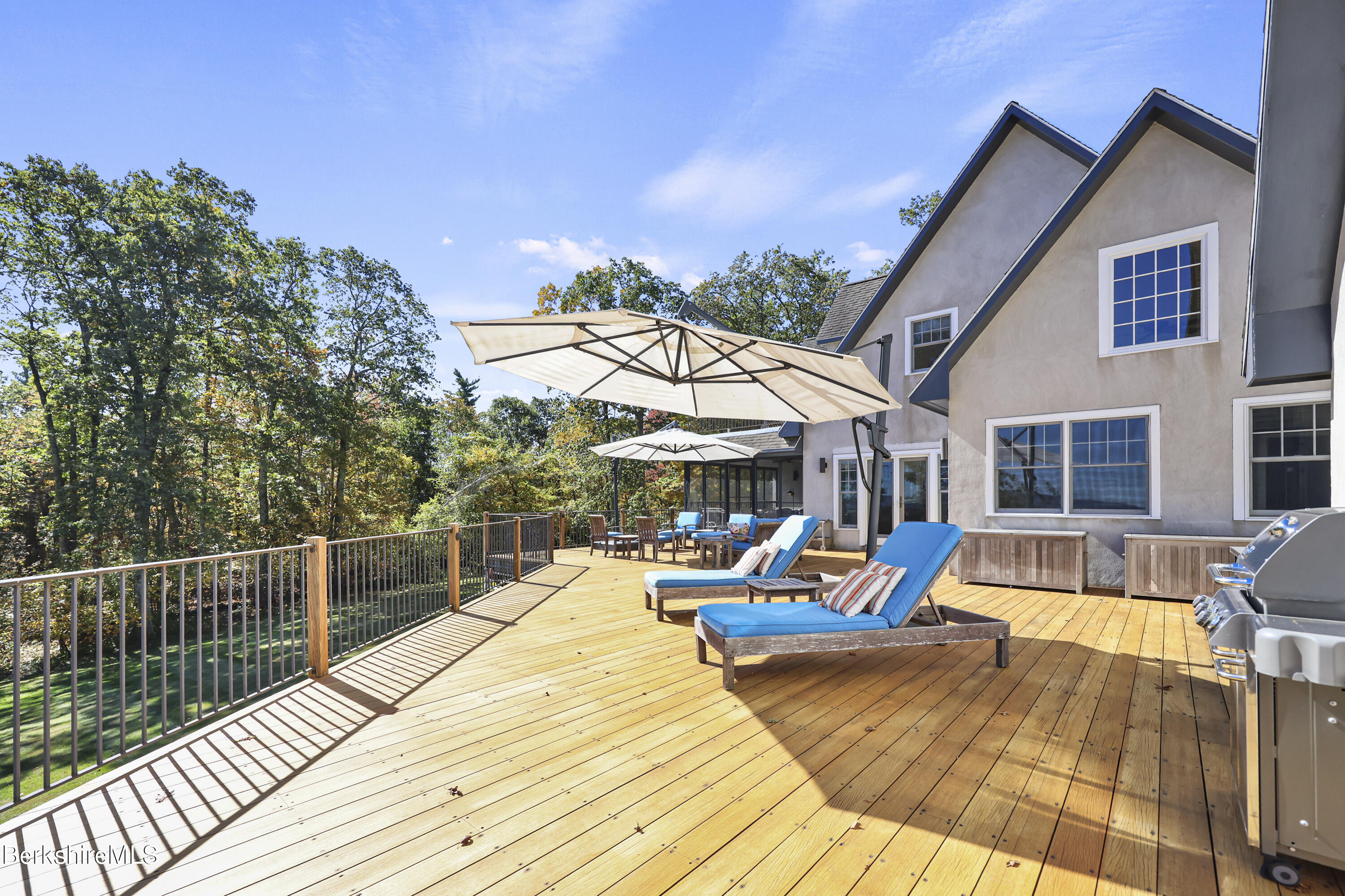36 Millard Road Egremont, MA 01230 - Photo 16 of 93 a view of a house with swimming pool and sitting area