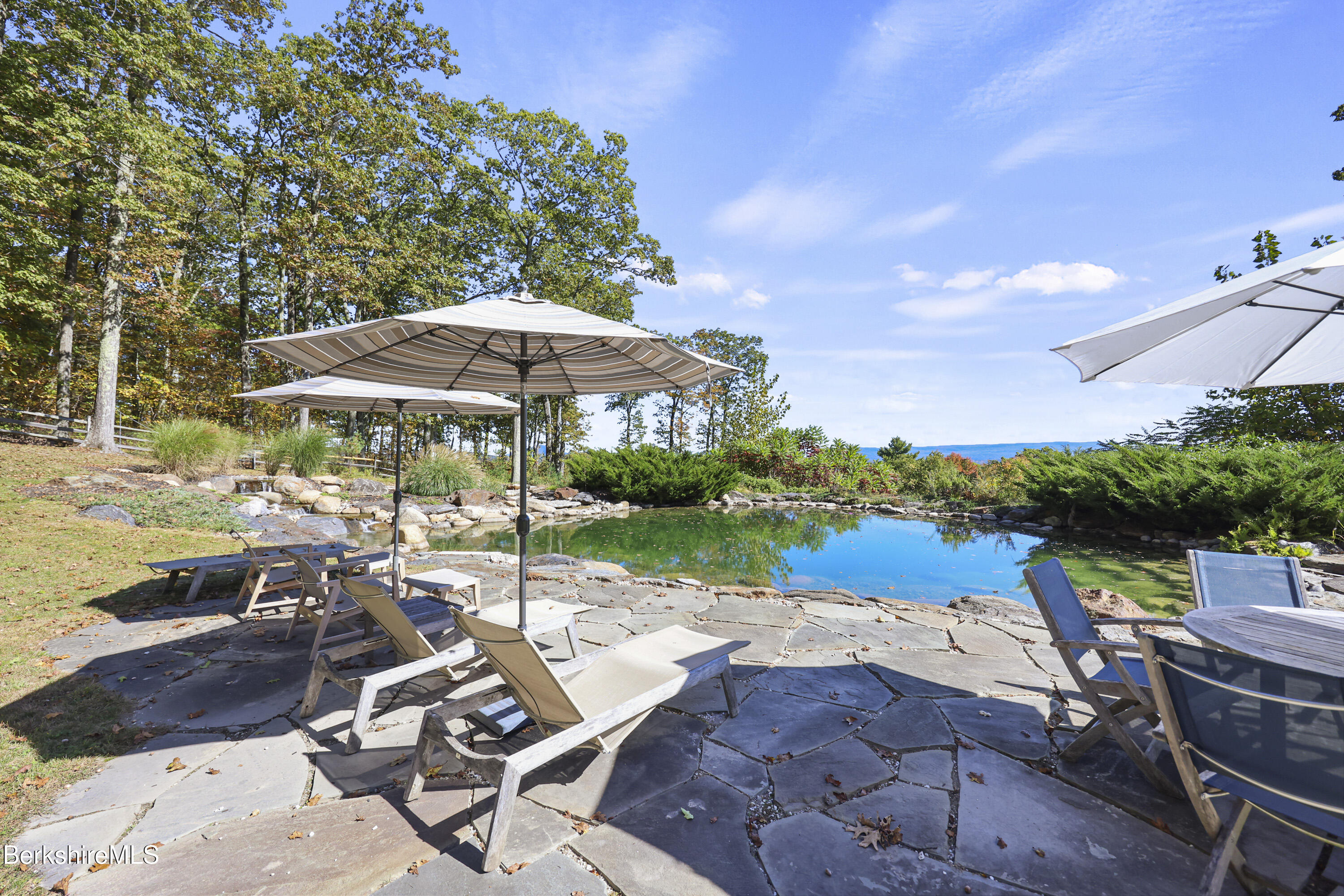36 Millard Road Egremont, MA 01230 - Photo 24 of 93 a view of backyard with outdoor seating and trees