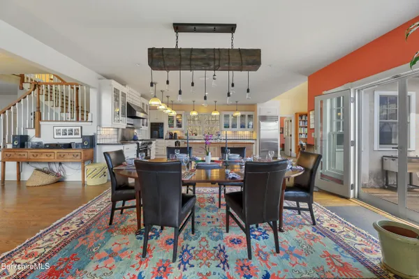 a bathroom with a toilet a sink and a mirror