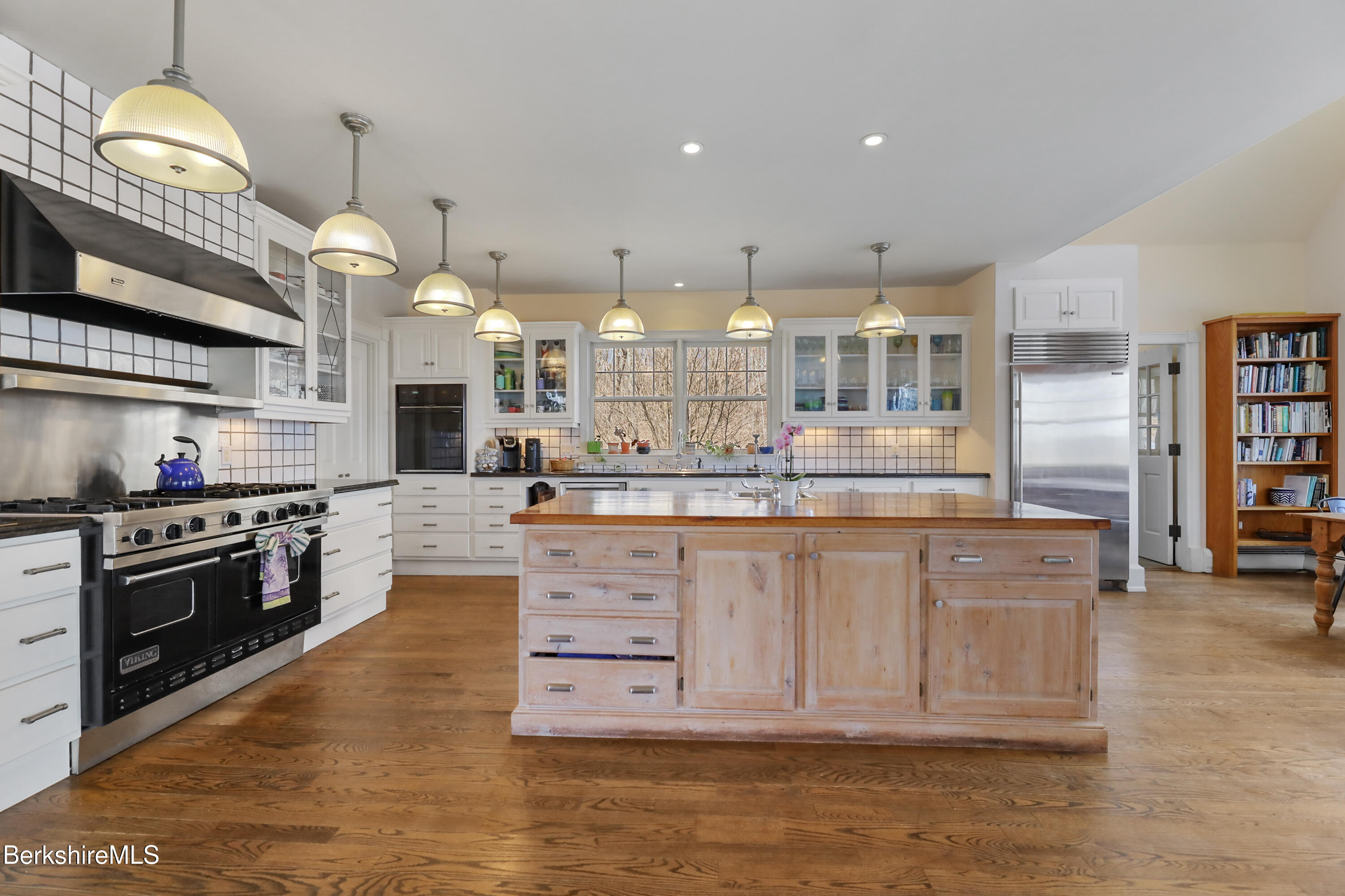 36 Millard Road Egremont, MA 01230 - Photo 43 of 93 a kitchen with kitchen island granite countertop a stove and a sink