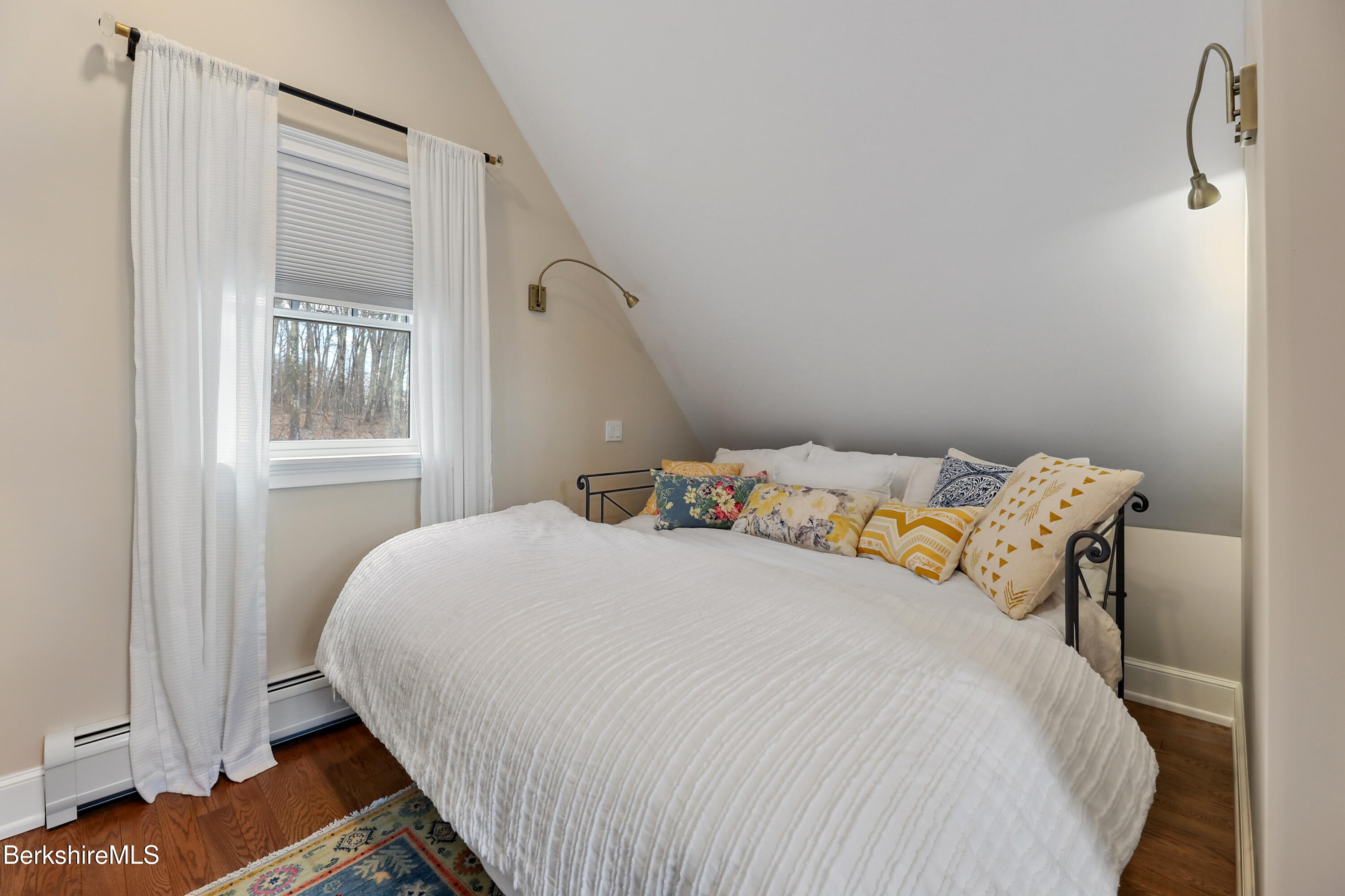 36 Millard Road Egremont, MA 01230 - Photo 62 of 93 a bedroom with a bed and wooden floor