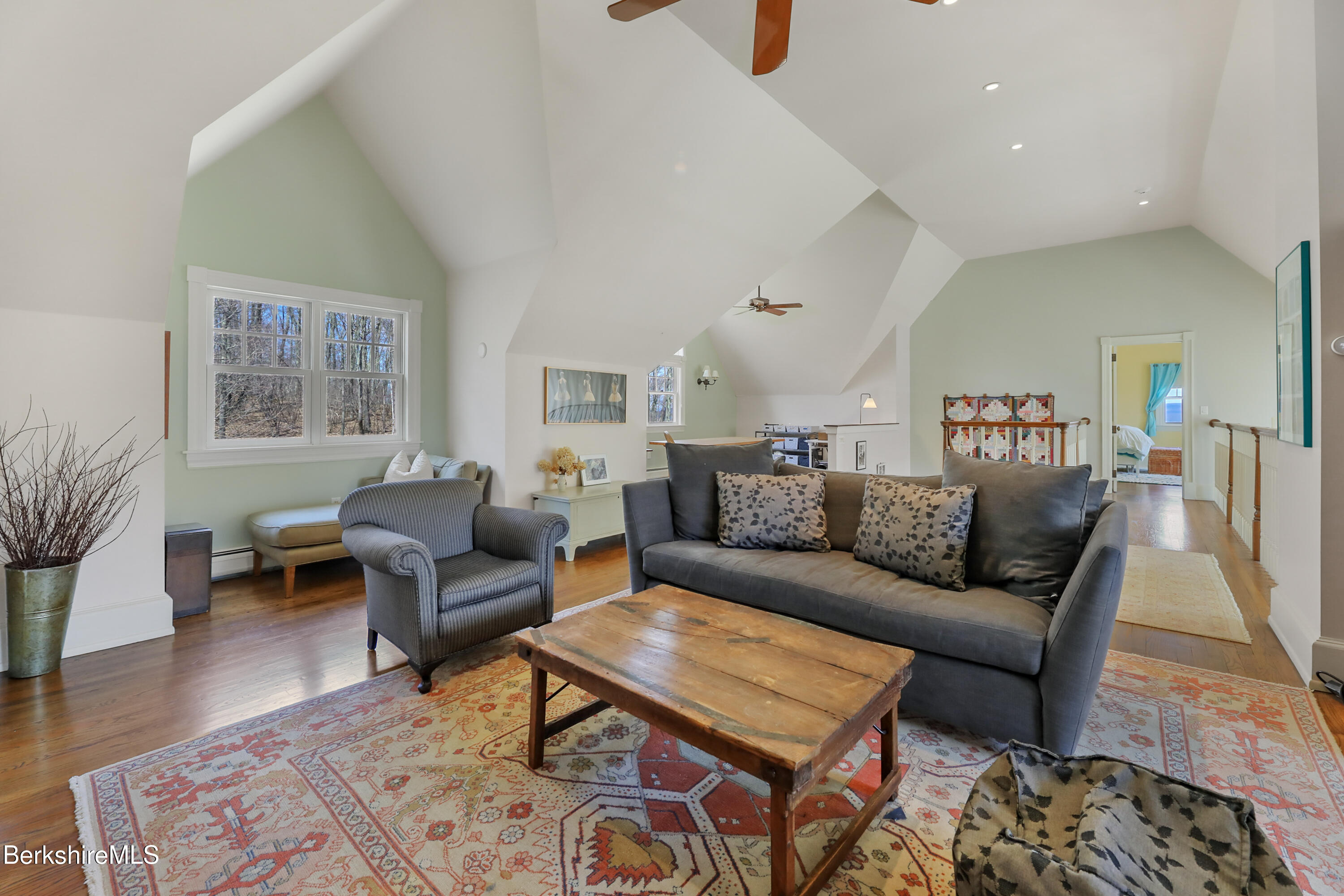 36 Millard Road Egremont, MA 01230 - Photo 85 of 93 a living room with furniture wooden floor and a lamp