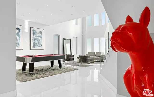 a room with furniture and a painting