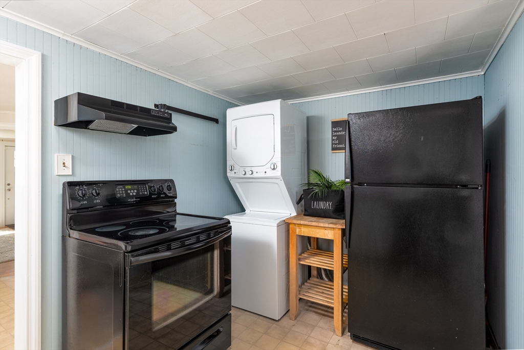 46 West Shore Road Holbrook, MA 02343 - Photo 15 of 33 a kitchen with stainless steel appliances granite countertop a refrigerator and a stove top oven