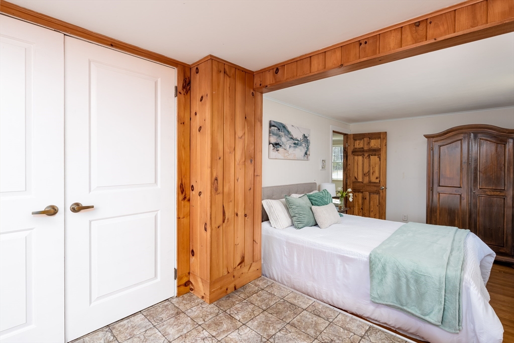 46 West Shore Road Holbrook, MA 02343 - Photo 17 of 33 a bedroom with a bed and a shower