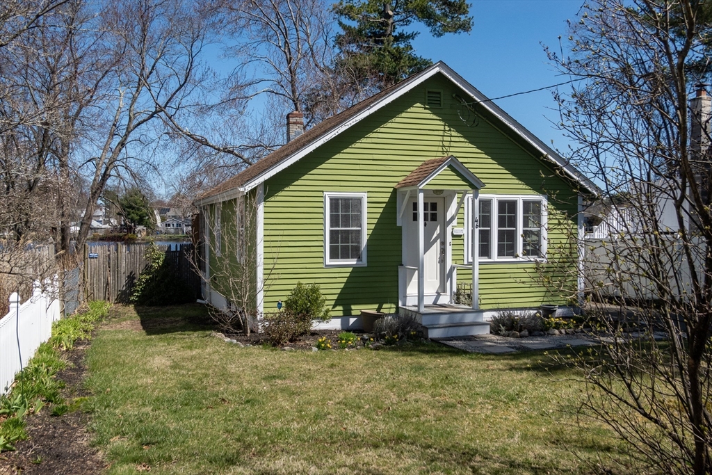 46 West Shore Road Holbrook, MA 02343 - Photo 32 of 33 a front view of a house with a yard