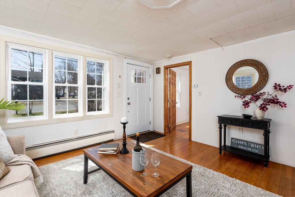 46 West Shore Road Holbrook, MA 02343 - Photo 8 of 33 a living room with furniture and a window