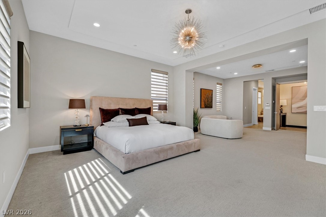 53 Garibaldi Way Henderson, NV 89011 - Photo 27 of 80 Bedroom featuring carpet, recessed lighting, and a chandelier
