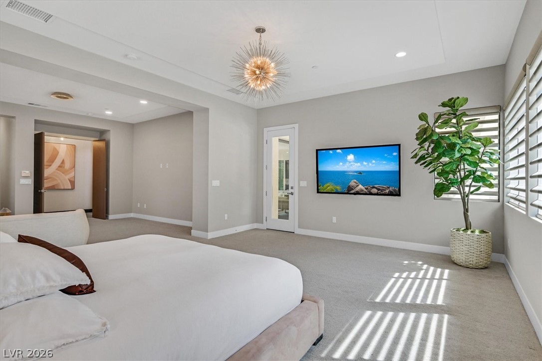 53 Garibaldi Way Henderson, NV 89011 - Photo 28 of 80 Carpeted bedroom with recessed lighting, a chandelier, and access to exterior