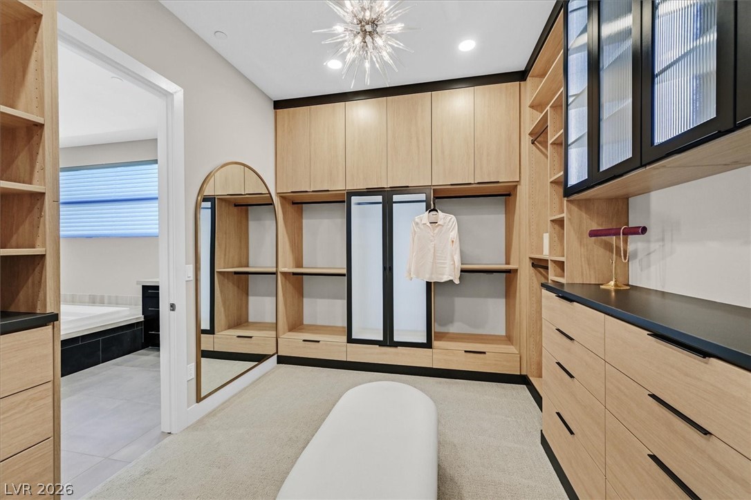 53 Garibaldi Way Henderson, NV 89011 - Photo 36 of 80 Spacious closet with a chandelier, and light carpet