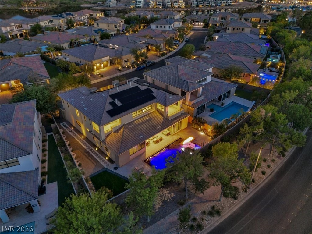 53 Garibaldi Way Henderson, NV 89011 - Photo 4 of 80 Aerial view of residential area featuring a pool area
