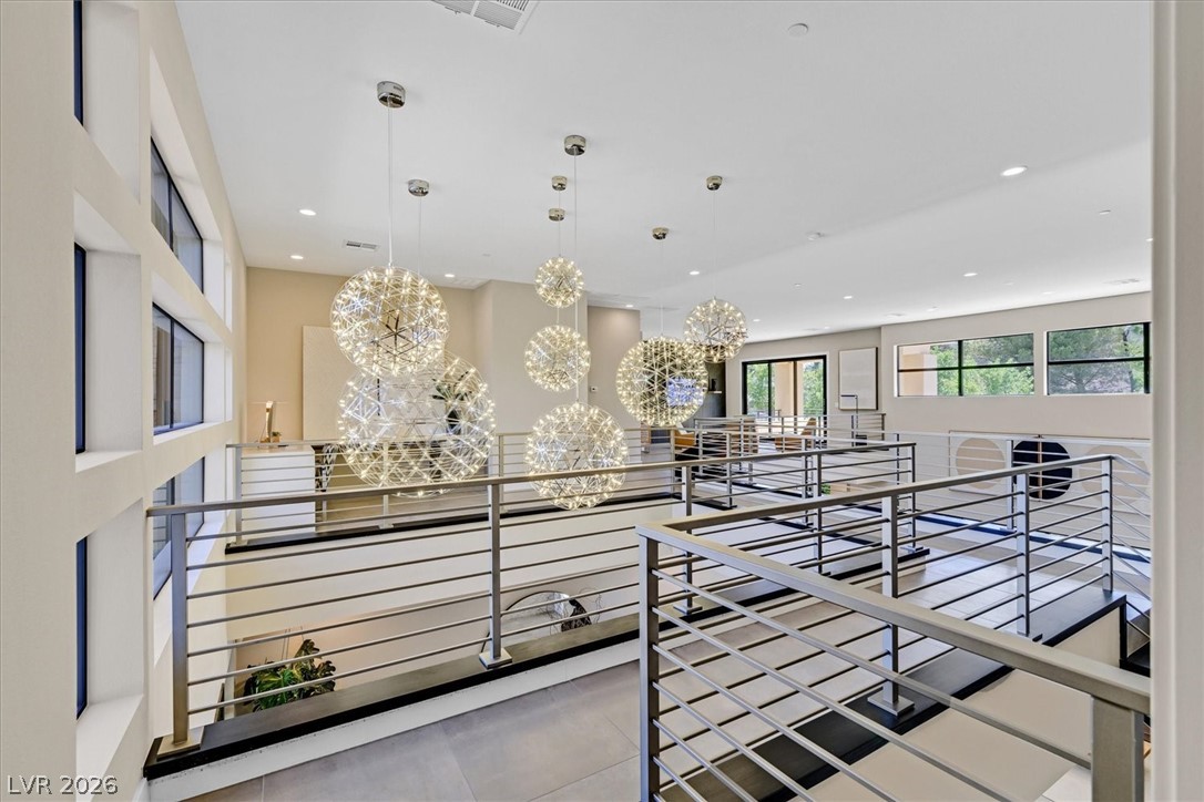 53 Garibaldi Way Henderson, NV 89011 - Photo 40 of 80 Stairs with tile patterned flooring and recessed lighting