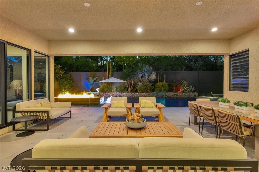 53 Garibaldi Way Henderson, NV 89011 - Photo 55 of 80 Fenced backyard with an outdoor hangout area and a patio