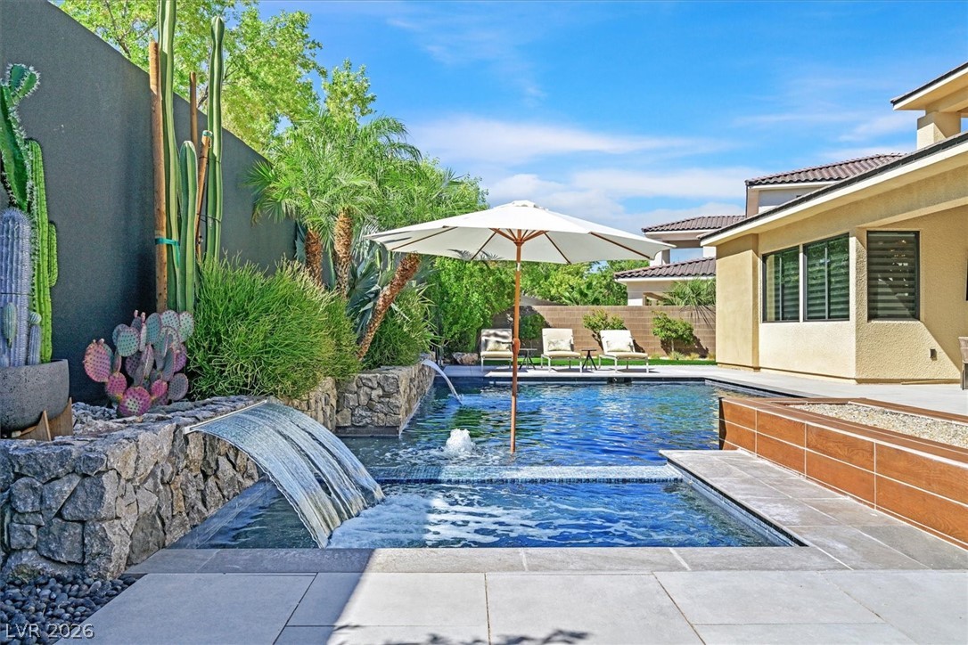 53 Garibaldi Way Henderson, NV 89011 - Photo 59 of 80 View of swimming pool featuring a patio area
