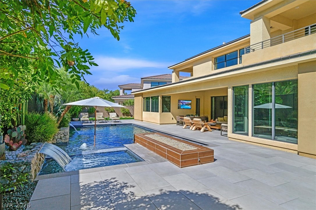 53 Garibaldi Way Henderson, NV 89011 - Photo 60 of 80 View of swimming pool with a patio and a pool with connected hot tub