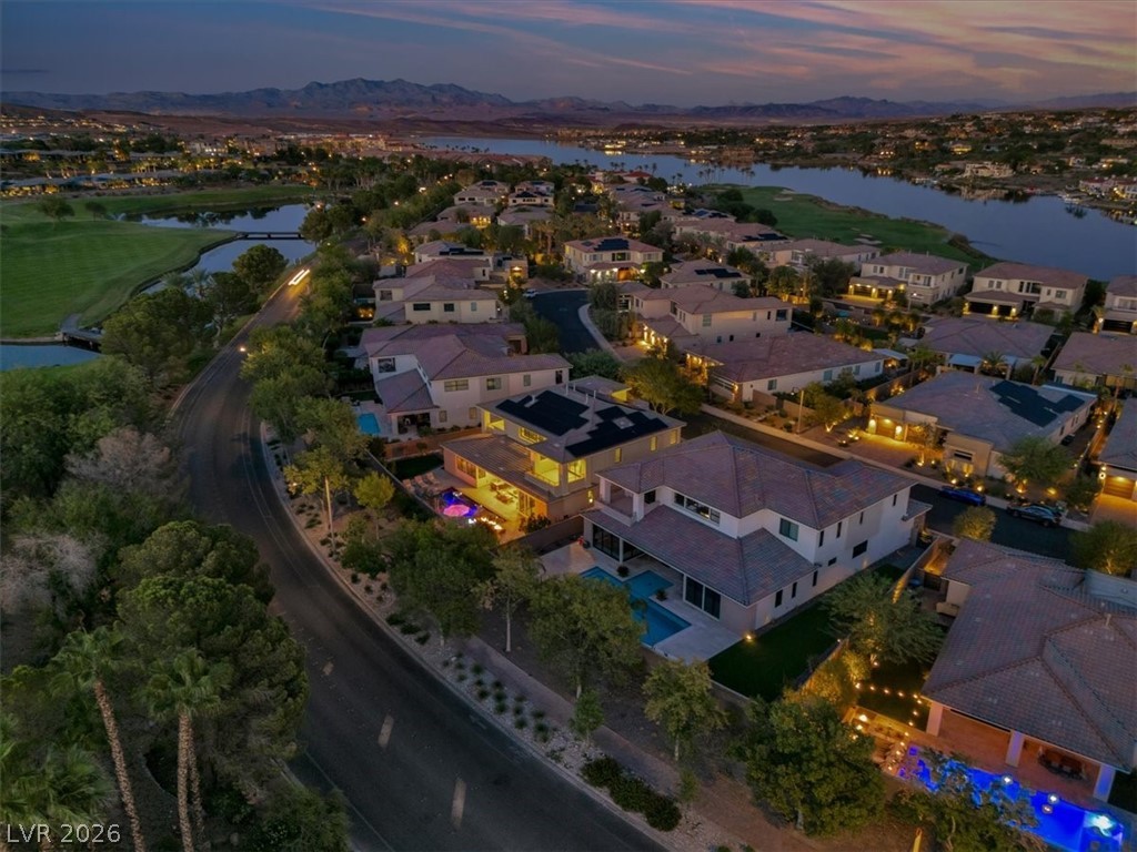 53 Garibaldi Way Henderson, NV 89011 - Photo 65 of 80 Aerial perspective of suburban area featuring a water and mountain view