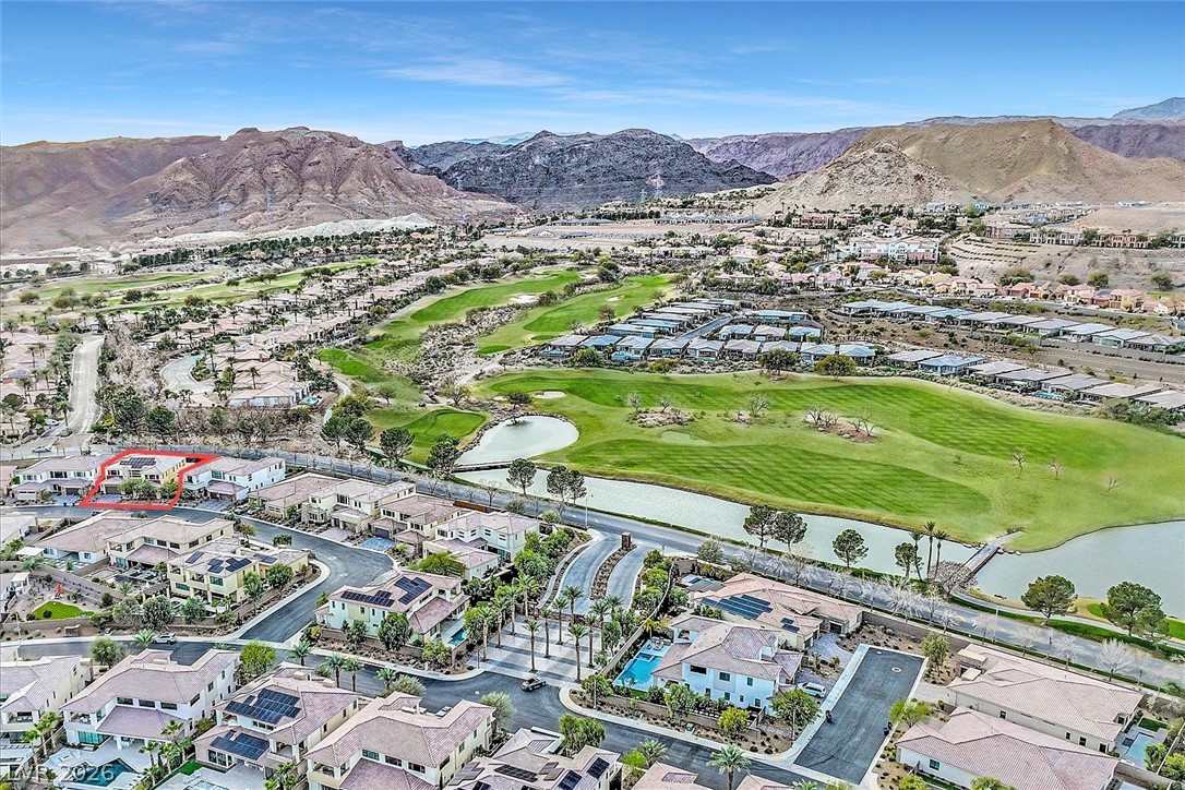 53 Garibaldi Way Henderson, NV 89011 - Photo 77 of 80 View of property location featuring a golf course, nearby suburban area, and a water and mountain view