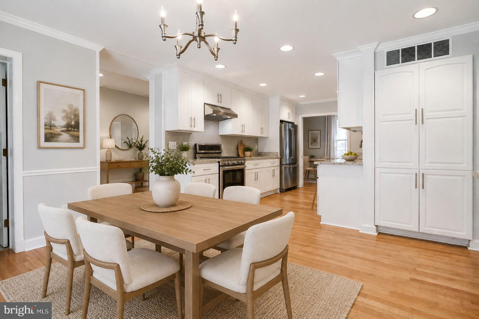 8500 Brook Road McLean, VA 22102 - Photo 9 of 44 a view of a dining room with furniture and wooden floor