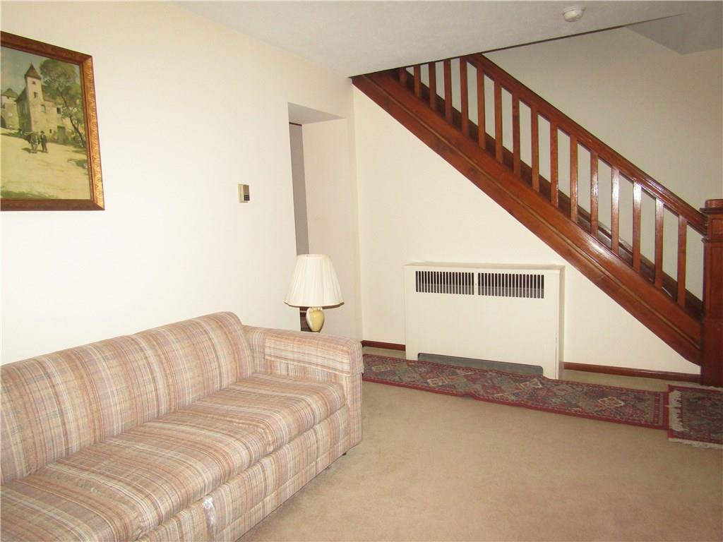 3116 Middletown Road Pittsburgh, PA 15204 - Photo 2 of 24 Light and Bright Living Room with Two Windows and Notice that gorgeous wooden stairway