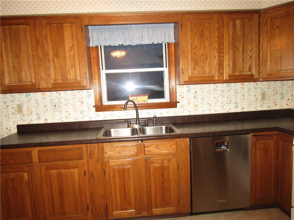 3116 Middletown Road Pittsburgh, PA 15204 - Photo 11 of 24 Kitchen sink with double bowls with a window overlooking a view of the city